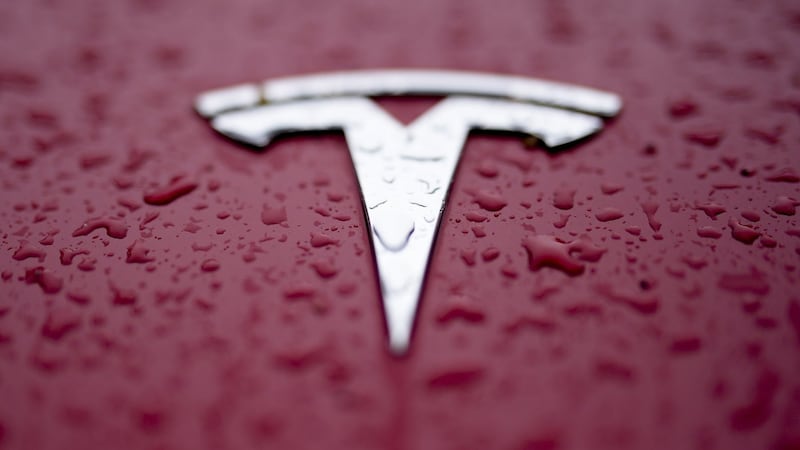 Tesla’s once-bullish tone on robotaxis shifts