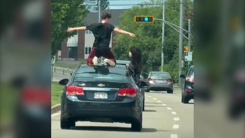 ‘I was just shocked’: Video shows youth riding on roof of moving car in Moncton