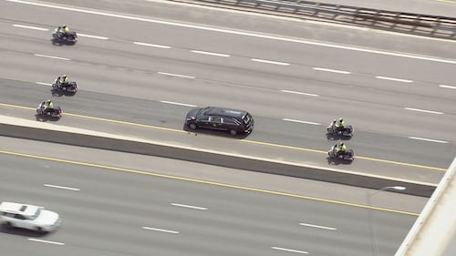 Body of OPP officer killed in Highway 401 crash transported to Oshawa funeral home