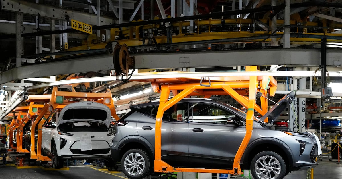 Vehicles move along the 2023 Chevrolet Bolt EV and EUV assembly line at the General Motors Orion Assembly. (AP Photo/Carlos Osorio)