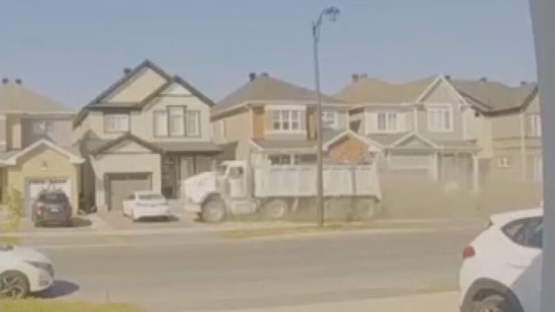 WATCH: Dump truck rams into vehicles outside Barrhaven homes