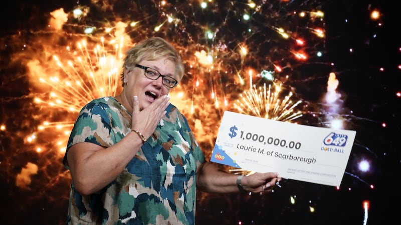 Scarborough woman wins $1 million LOTTO 6/49 Gold Ball prize after forgetting ticket in bag