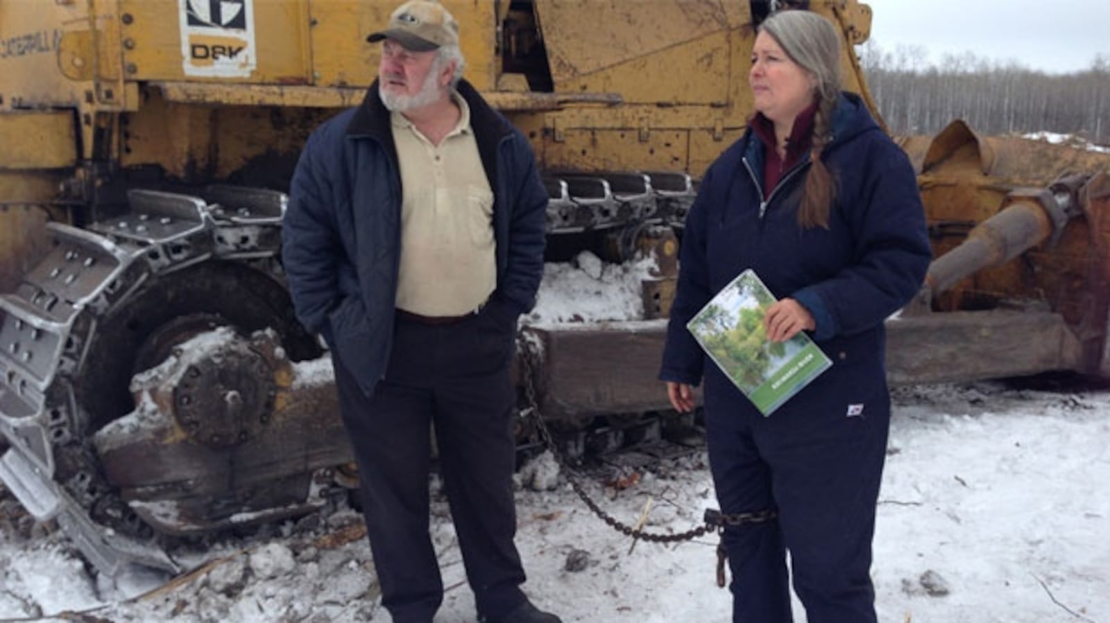 Barn Operator Woman chains herself to bulldozer in protest of hog barn operator ...