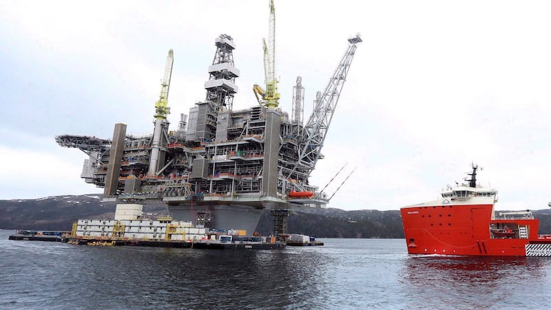 Credit agency says surging global oil prices will help N.L.'s bottom line