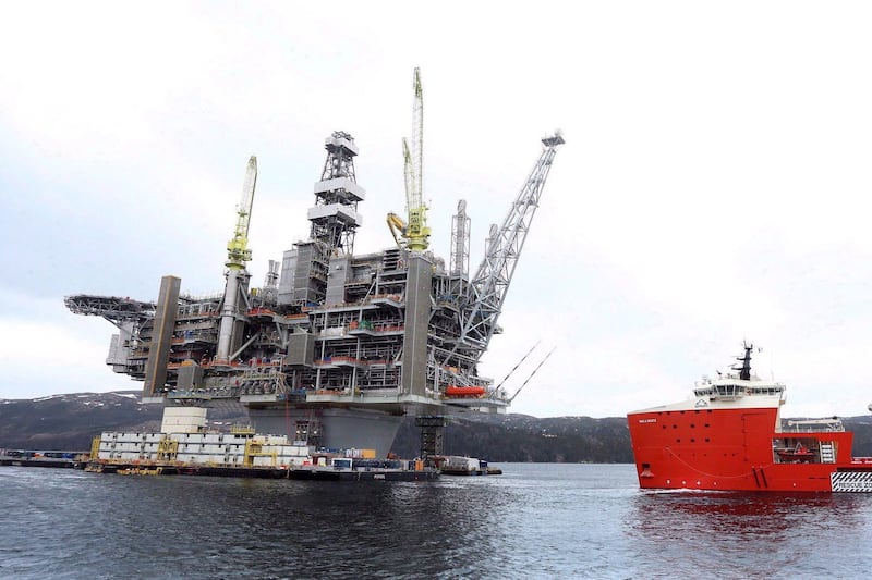 Credit agency says surging global oil prices will help N.L.'s bottom line