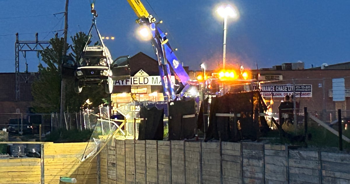 Truck crashes into pit at construction site