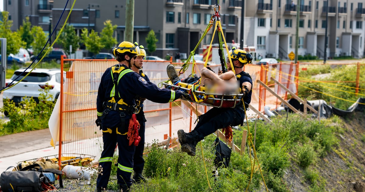 Injured worker rescued after falling from ladder into construction pit