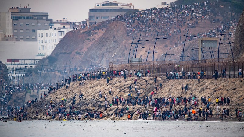 Tens of thousands of migrants voluntarily leave after crossing into Spanish territory of Ceuta