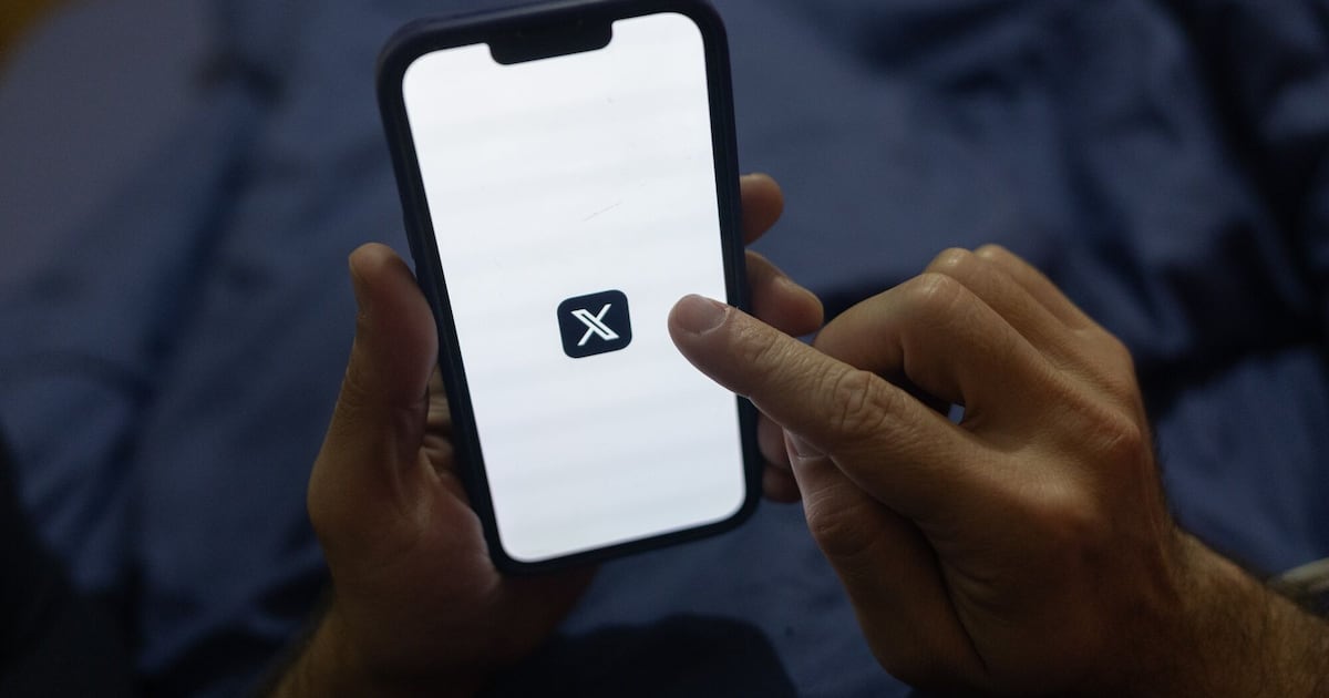 The logo of X, the social media platform formerly known as Twitter, displayed on a smartphone in Sao Paulo, Brazil, on Saturday, Aug. 31, 2024.