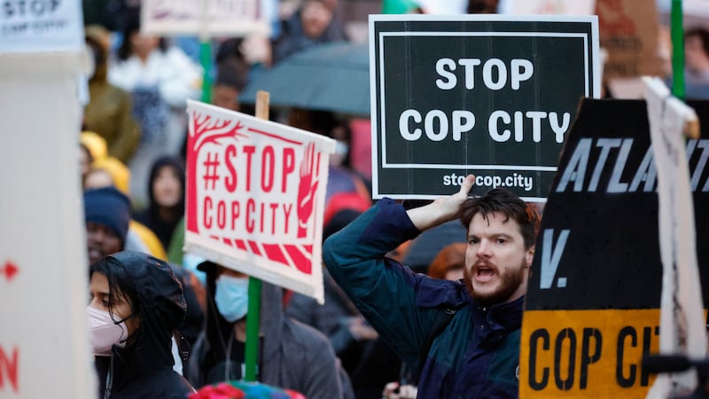 American activist charged after phone wiped during airport search in ‘entirely unprecedented’ case