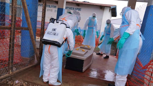WHO chief says Ebola outbreak is outpacing response as aid workers strike over pay