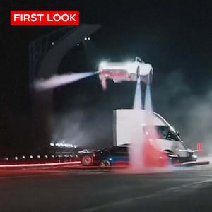 Tesla’s Elon Musk unveils flying sports car that was in development for years