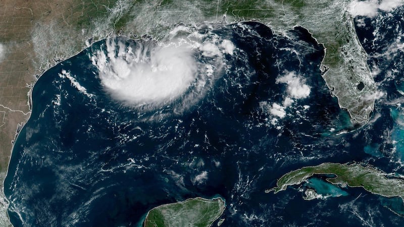 Coastal Texas and Louisiana warned of tropical storm, while another storm moves toward Hawaii