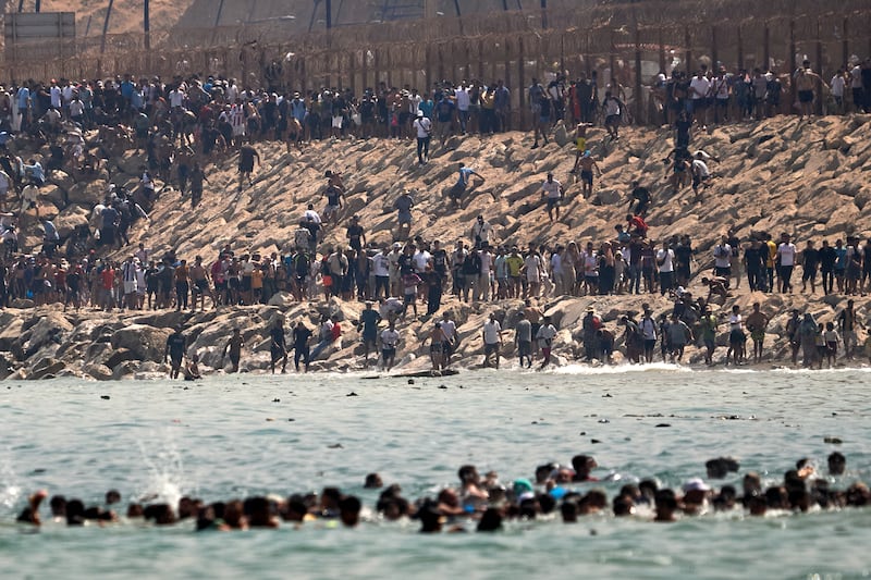 Spain's Ceuta sees 60,000 people breach Morocco border, 41 dead