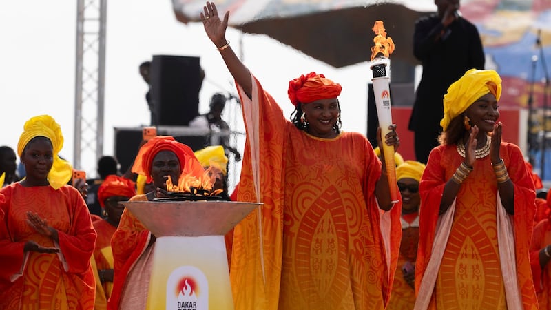 Olympic flame arrives in Senegal for the first Olympic event to be held in Africa