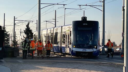 Crews and police respond to a morning crash between an LRT train and a semi-truck on Nov. 26, 2025. (Evan Klippenstein/CTV News Edmonton)