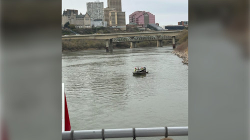 Passengers on the Edmonton Riverboat are helped to shore by Edmonton Fire Rescue Services during a Mother's Day cruise on May 10, 2026. (Source: Christa Jones)