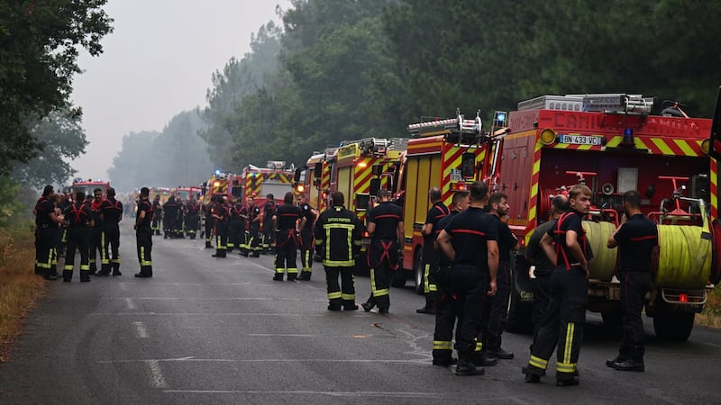 France and Spain battle wildfires as more than 250,000 people are forced to flee homes