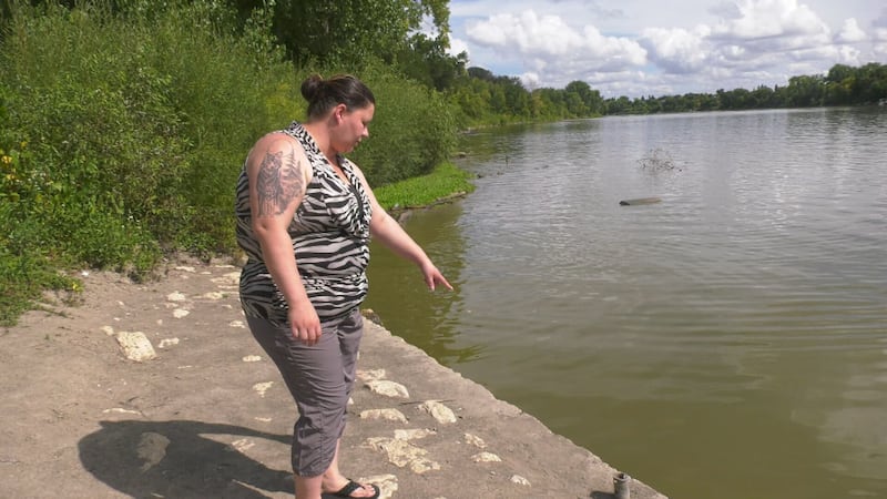 Winnipeg woman jumps into the Red River to save child and her father from drowning