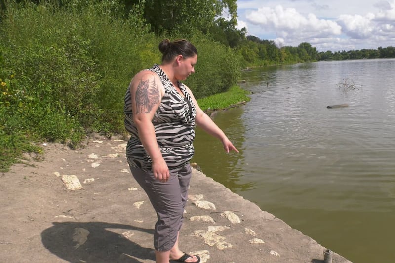 Winnipeg woman jumps into the Red River to save child and her father from drowning