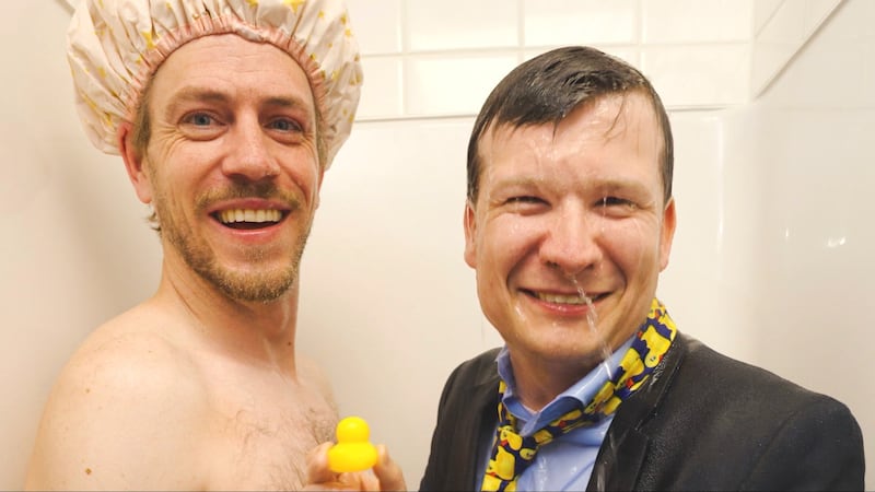 Calgary Mayor Farkas showers with CJAY92’s Tyler Middleton, making good on water-use promise