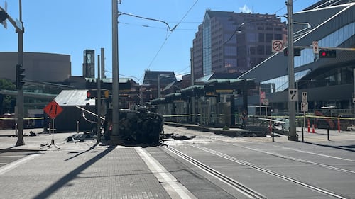 A driver was hospitalized after rolling their vehicle at 100 Street and 102 Avenue, disrupting LRT service for several hours, in Edmonton on June 24, 2026. (Evan Klippenstein / CTV News Edmonton)