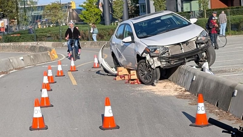 Vehicle crash in Olympic Village underscores importance of protected bike routes