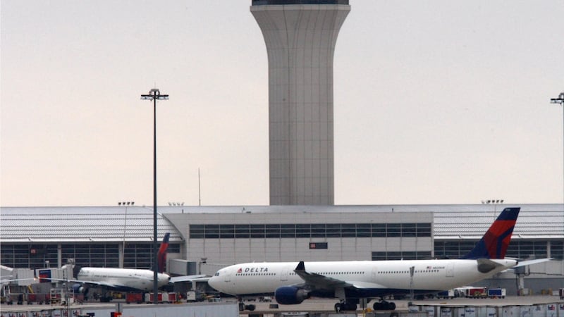 Car crashes into a passenger terminal at Detroit Metropolitan Airport, driver arrested