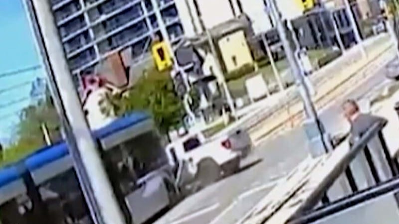 LRT train hits pickup truck and derails in Kitchener, Ontario