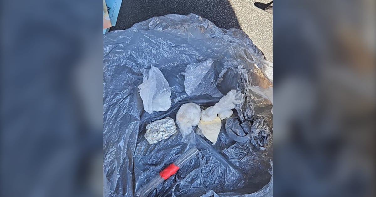 Cambridge man charged after driver found asleep behind wheel with suspected drugs, police say