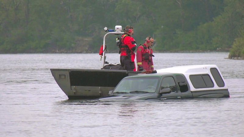 Calgary firefighters locate driver of truck found floating in Bow River