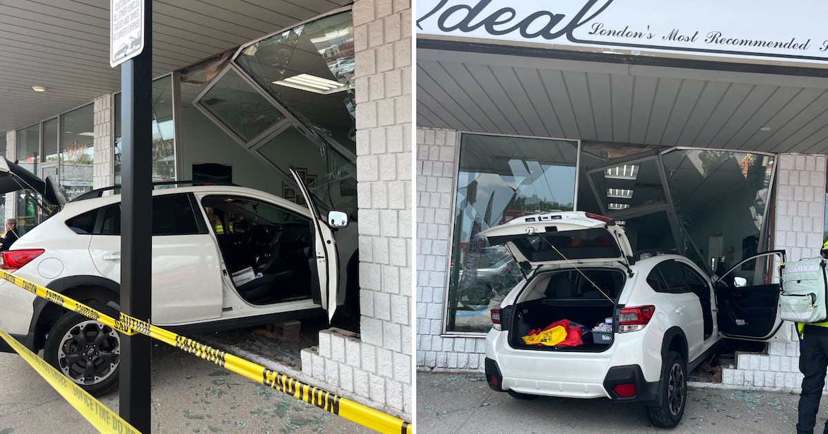 Vehicle crashes into Springbank Drive storefront, one person injured