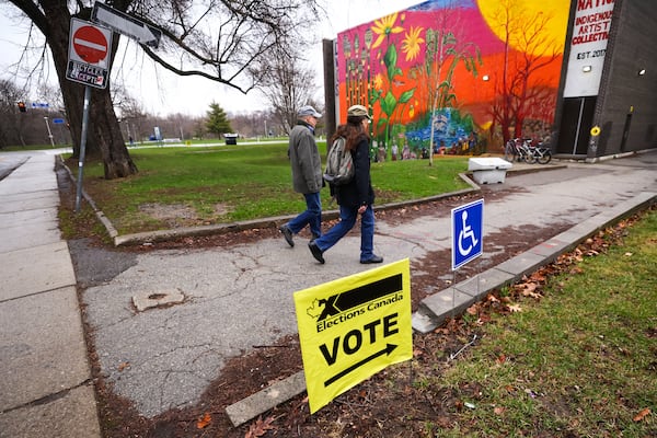 Toronto voters are going to the polls in two federal byelections today. A majority government hangs in the balance