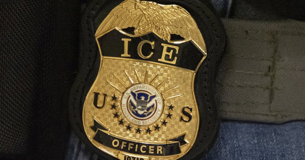 A federal agent wears an Immigration and Customs Enforcement badge in New York, June 10, 2025. (AP Photo/Yuki Iwamura, File)