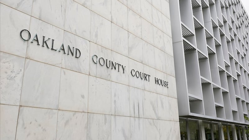 Michigan woman pleads no contest to abuse after 3 kids are found living alone for years