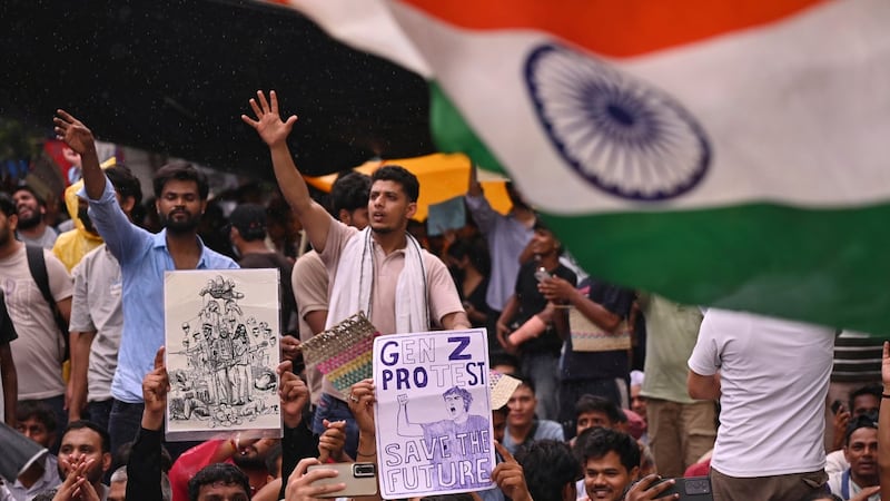 India suspends policeman for firing AK-47 at student protesters