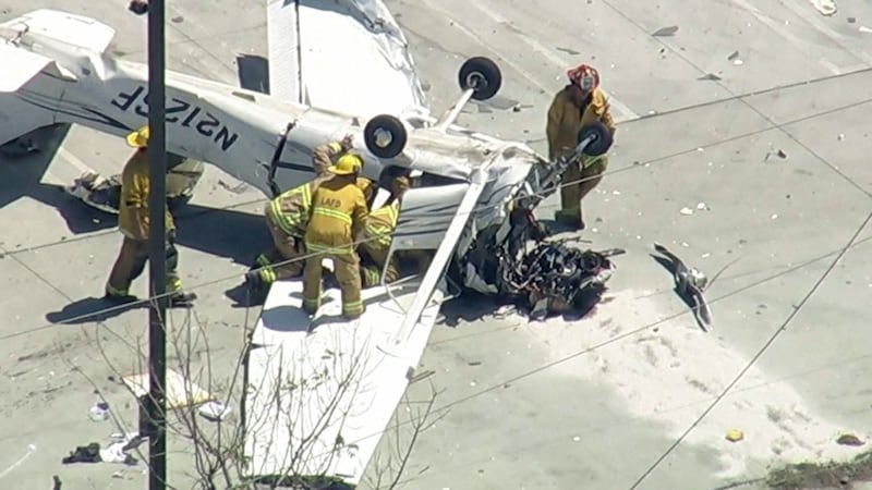 Small plane crashes in parking lot of Southern California auto store