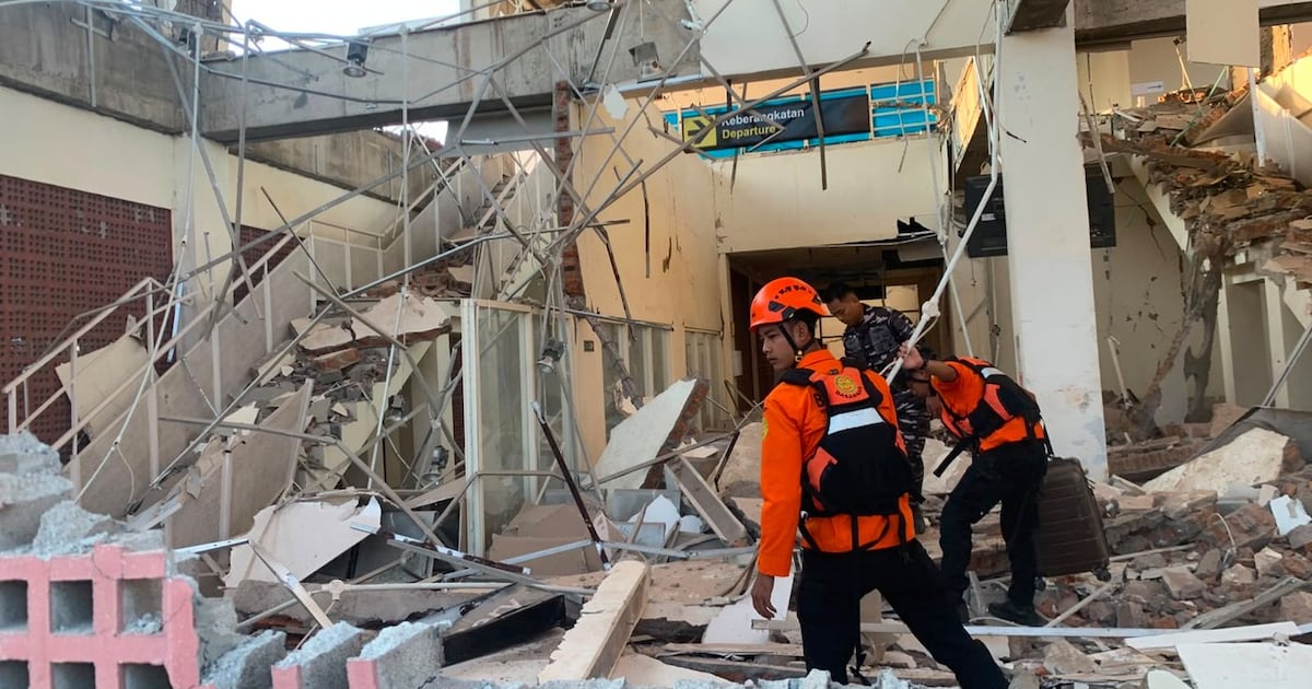 Rescuers dig through rubble and landslides after Indonesia quake kills 53