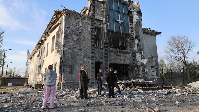 Russian attacks kill at least 2 as Ukraine strikes a Russian drone factory