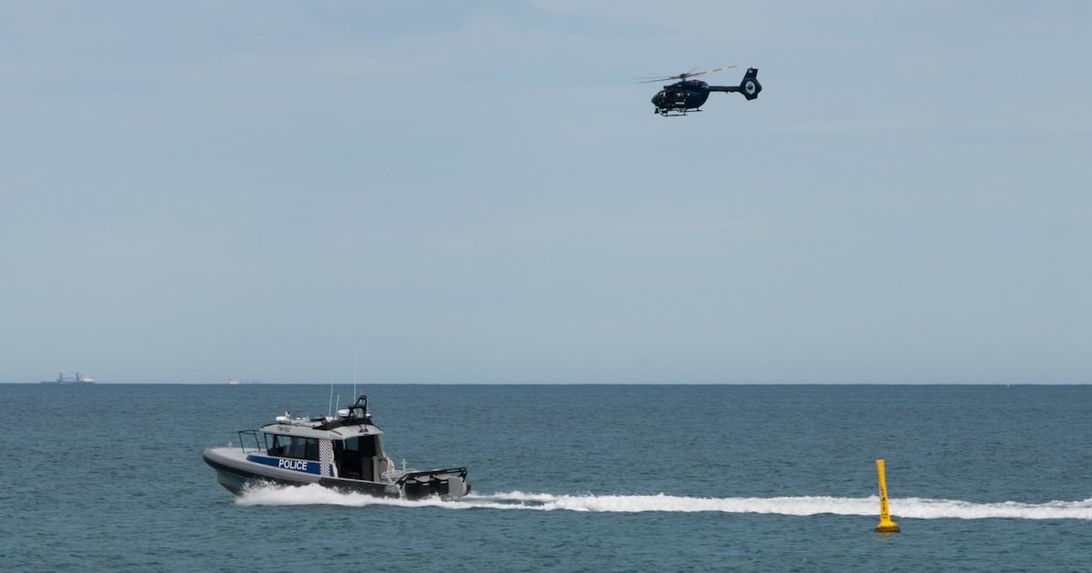 Photo: ctvnews.ca A police boat and and helicopter patrol the area at Sorrento Beach, in Perth, Australia, Friday, Sept. 18, 2026, after a