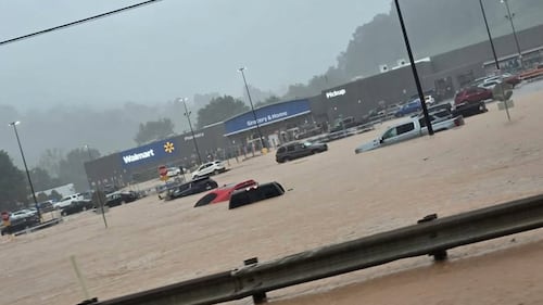 U.S. National Guard is deployed as flash floods in West Virginia inundate homes and businesses