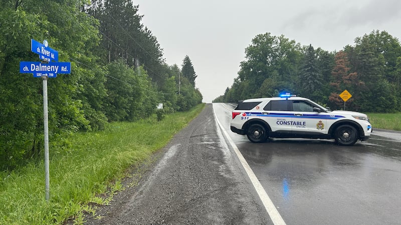 Ottawa firefighters battle house fire in the rain near Osgoode