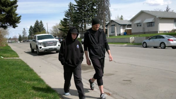 Calgary dad attacked without provocation while walking his teen to the bus stop