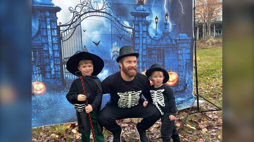 A father is pictured with his two children, in costume at the Gaetz Brook Greenway for the Halloween Trick-or-Treat Trail Walk in East Chezzetcook, N.S., on October 25, 2025. (Emma Convey / CTV Atlantic)