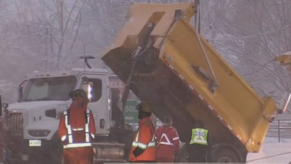 Snowplow driver charged after crashing into overpass with box raised