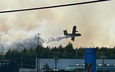 A fire is pictured burning in the  Julius Boulevard and Dugger McNeil Drive area of Bayers Lake, N.S., on Aug.12, 2025. (CTV Atlantic / Mike Lamb)