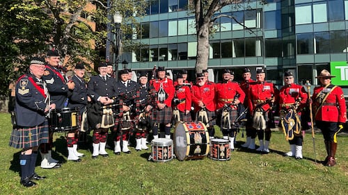 A pipe band is pictured.