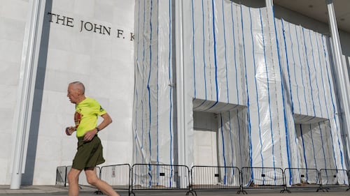 Fencing goes up around the main Kennedy Center building after Trump-aligned board votes to close it