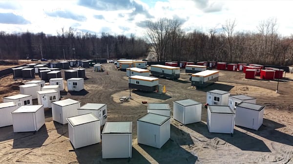 London shelter village cuts encampments, but operating costs spark debate