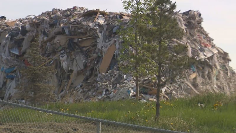 ‘Can’t be good’: Southeast Calgary residents anxious over garbage, dust from recycling plant